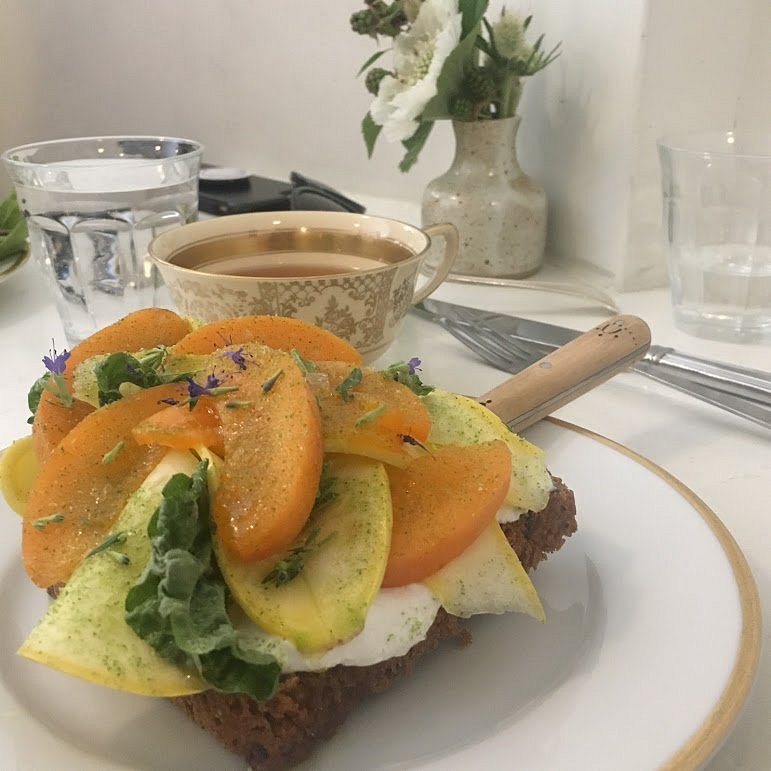 Maurice signature dishes Open Face Sandwich, Meyer Lemon Ginger Soufle Cake, Poached Egg in Polenta, Duck Confit and Apple Quiche